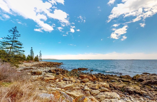 Two-story, dog-friendly home with gas grill, deck, & bay views- near the ocean