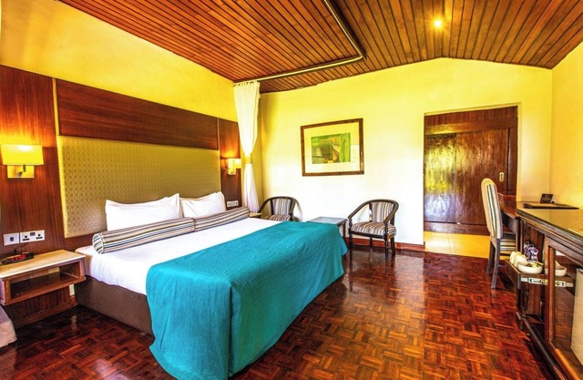 Unwind in a Serene Setting, Room Amidst Lush Greenery and Scenic Lake