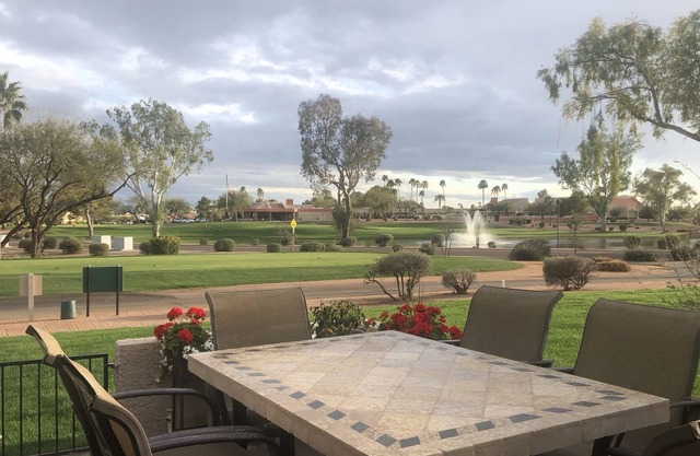 Updated 2BR end unit townhome, 10th tee box with water view and wrap around deck