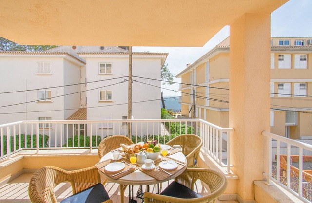 Apartamento Talaia 1A con balcón, Wi-Fi, jardín y terraza