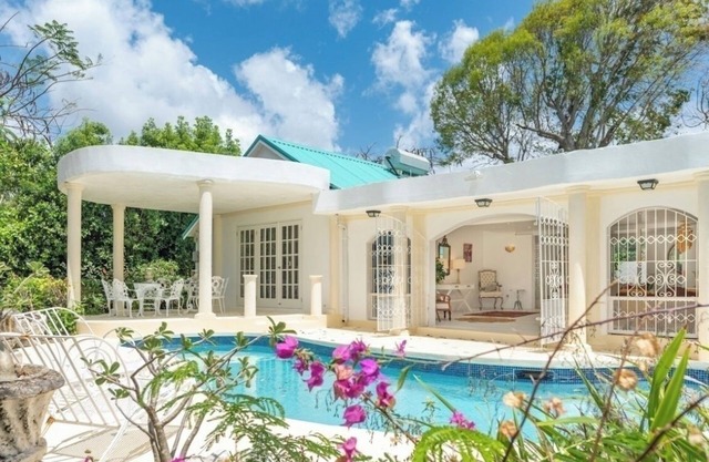Vibrant 4-Bedroom Villa with Pool & Polo Views, Steps from Paynes Bay Beach.