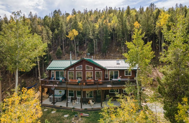 VIEWS, hot tub, barrel sauna, axe throwing, arcade room, 85" tv, office space