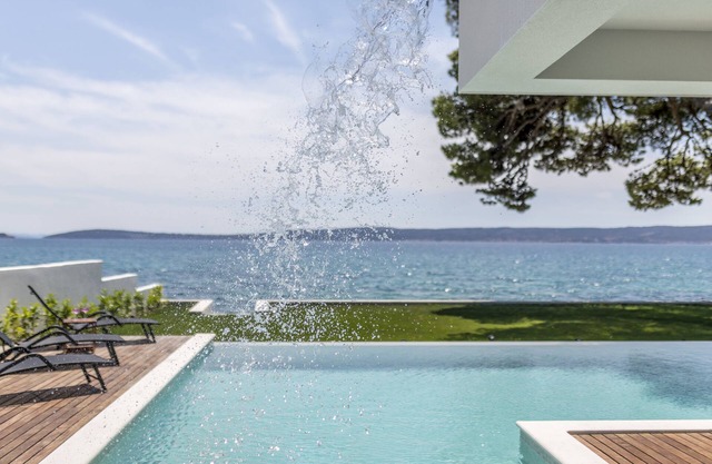 Villa Sea Star - seafront beach with heated 80m2 pool, BBQ and car garage.