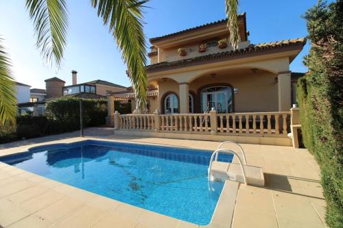 Villa with pool and front sea views in Alcaidesa