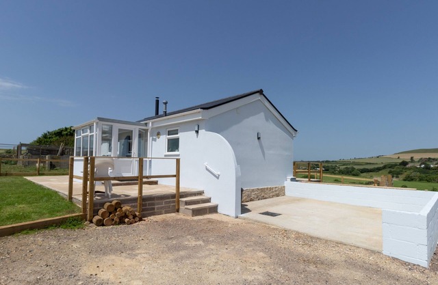 VISTA AL PUEBLO, admite mascotas en Burton Bradstock, Ref 1008498