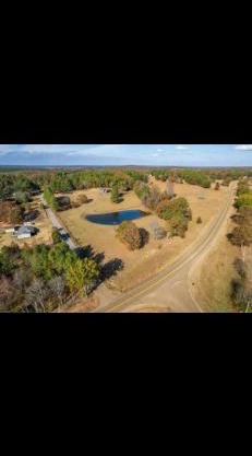 water valley, tiny home animal petting exp, fruit trees, fishing pond, stars, camping ect