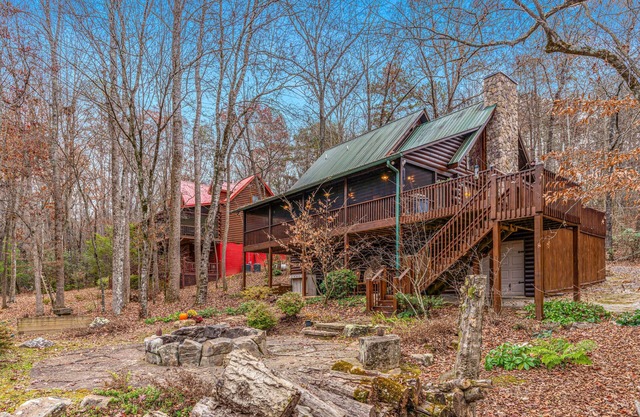 Waterfront retreat with a deck, grill, fireplace, board games, W/D, & central AC