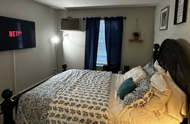 Your Poolside Getaway: 2BR/2BA Condo w/ Fun Games, parking, gym, & playground