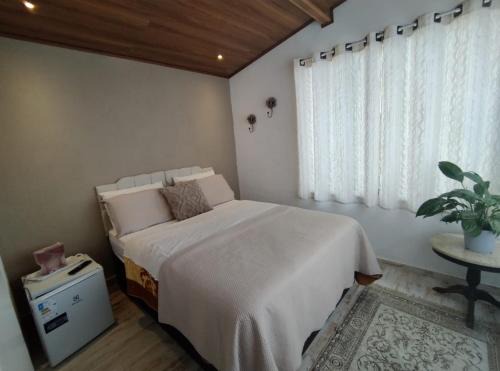 Petropolis Apartamento | Ótima suíte próxima ao centro