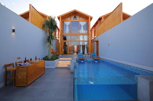 Dhahban Chalet De Esquí | أكواخ البحيرات