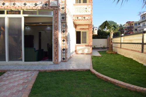 Al-Muntazah Chalet De Esquí | شالية ارضى في المعمورة الشأطي