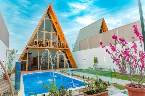 Al Kura Chalet De Esquí | شاليهات اكواخ كايا الفندقية