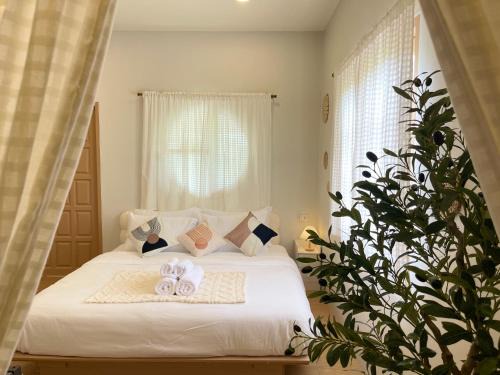 Trat Casa | อุ่นไอดิน Home Stay