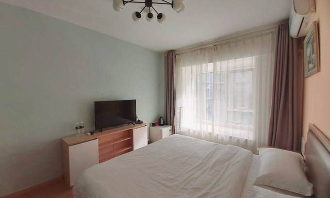 Chengyang Apartamento | 青春球场,世纪公园,青岛国家广告产业园丰富美食
