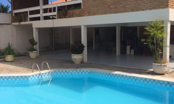 Barra Mar Casa | 06 suites con aire acondicionado a 40 metros de la playa principal con piscina y sala de juegos.