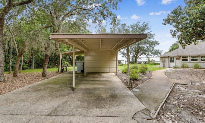 Navarre Cabaña | 1 acre Historic Waterfront Cottage, private beach, pet friendly, 3 miles to Gulf