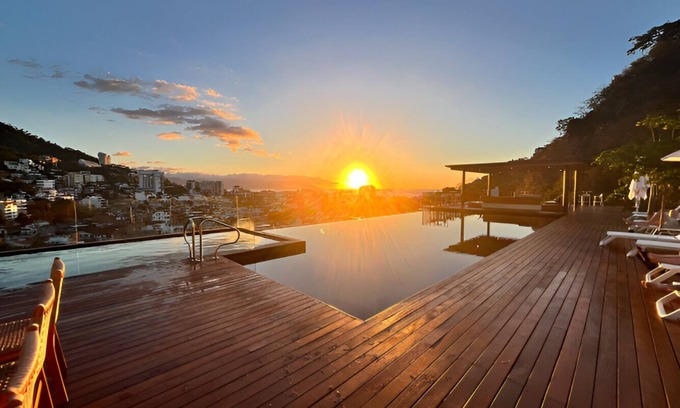 El Caloso Condominio | 1 Bedroom Condo with River & Partial Ocean View in Luxury New Building!