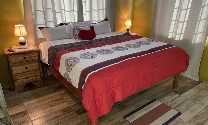 Negril Casa | 1 King bed, cable tv , wifi mini fridge stocked with welcome beer