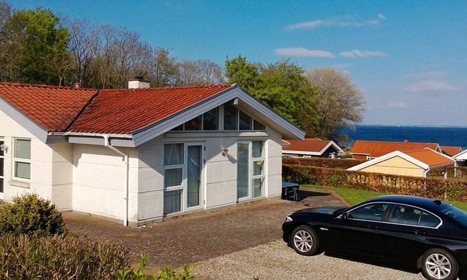 Grønninghoved Strand Casa | Casa de vacaciones contemporánea en Sjølund con sauna