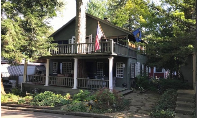 Chautauqua Casa | 100 YEAR OLD MAPLE TREE GROWING THROUGH FRONT PORCH
