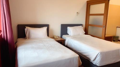 Taman Pertama Hotel | 103 Hotel