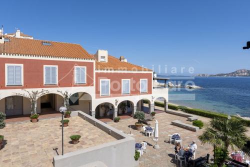 Palau Villa | 12 CENTRO - Trilocale vista mare sul Faro di Porto Faro