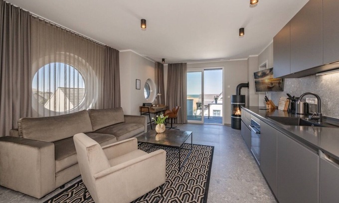 Lubmin Apartamento | 150m to the beach! Modern 60m² sea view apartment: balcony & fireplace, for 4 pers.