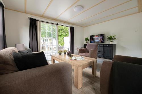 Oisterwijk Chalet De Esquí | 16, Geniet van de rust, natuur & gratis parkeren!