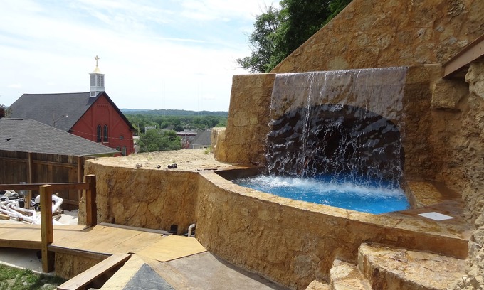 East Dubuque Casa | 1850 Cabin Home, Waterfall, Family Getaway, Corporate Party, Weddings