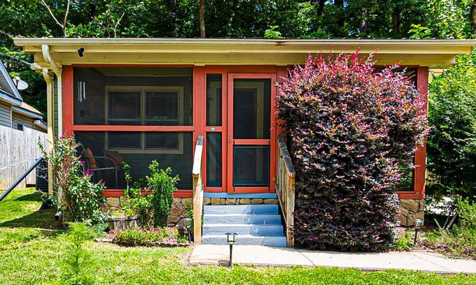 Chimney Rock Casa | 1920s artsy cottage with Chimney Rock views, yard, sauna, & firepit - dogs ok