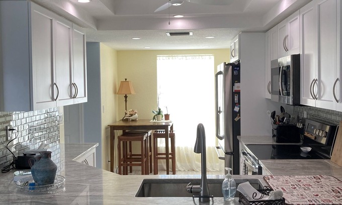 Bonita Springs Condominio | 1st Floor Condo with community pool & 1 dedicated carport space