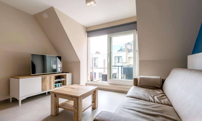 Koksijde-Bad Apartamento | Piso de 2 dormitorios con vista lateral al mar