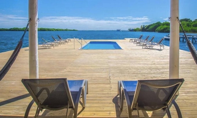 Jonesville Villa | 2 Bedroom Villa 2 bath with amazing dock with pool over the ocean!