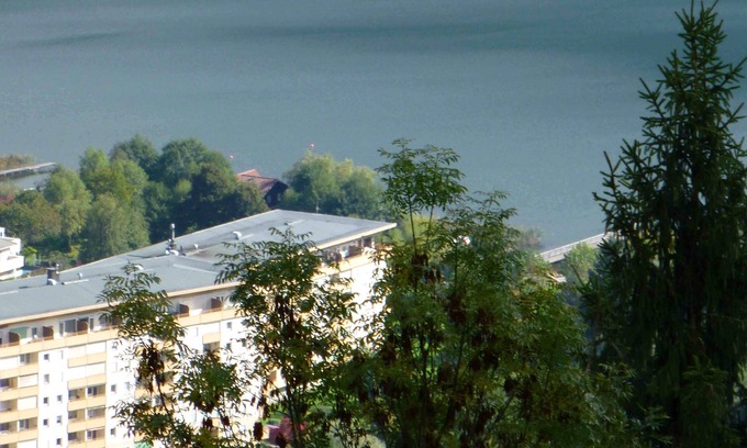 Bodensdorf Apartamento | Apartamento con 2 dormitorios y una maravillosa vista al lago, piscina cubierta y playa privada. Red de internet WiFi gratis