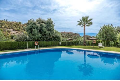 Benahavis Apartamento | 2 Bedrooms - Sleeps 4 - Garden and Pool with View
