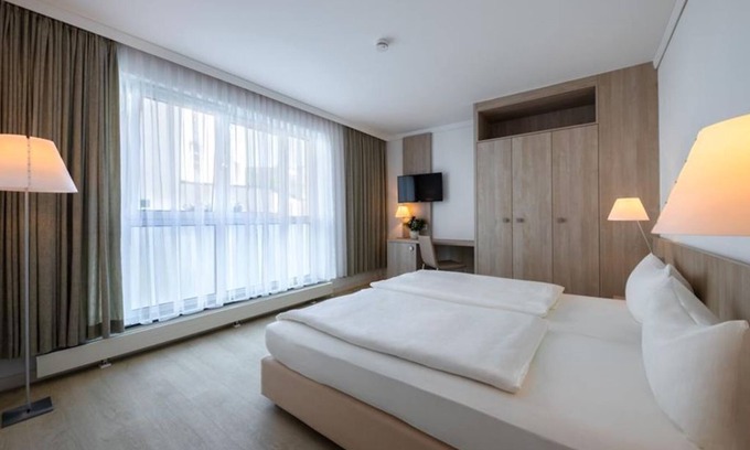 Norderney Casa | 2-room app. (up to 3 pers.), bed & breakfast. - Michels Strandhotel Germania