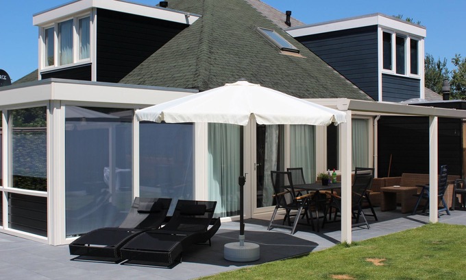 Stavenisse Casa | 200 metros del mar, casa para 6 personas con sauna, piscina, tenis y parque infantil.