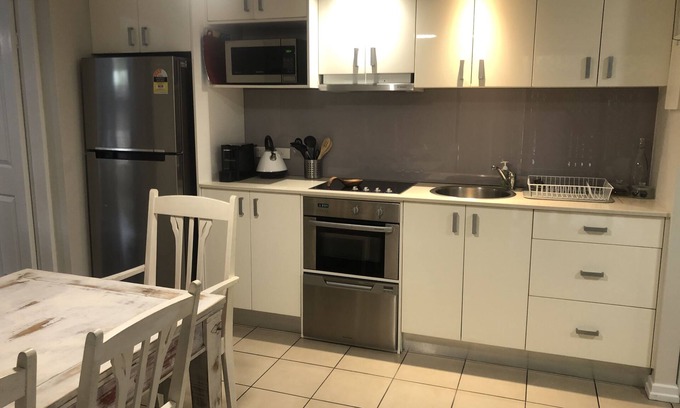 Brisbane Apartamento | Unidad de planta baja 2BR Brisbane con patio privado