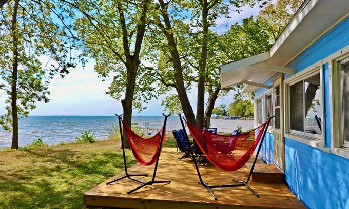 Isle Cabina | 2BR Cabin on Lake w/ Beach, Boat Dock in Protected Channel, & 74ft Viewing Dock