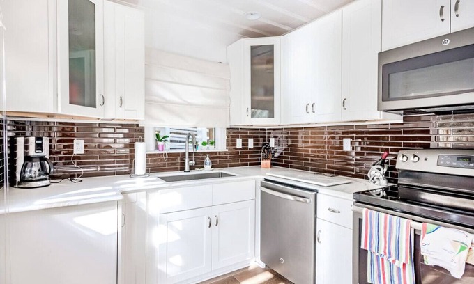Neptune Beach Casa | 3/2 Pool Home - 2 blocks from bch - w/ Golf Cart!