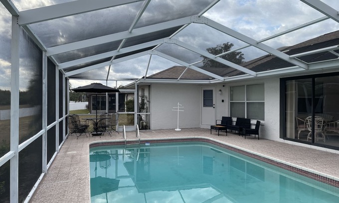 Ocala Casa | 3/2 spacious house w/ screened in pool perfect for a BIG Family.getaway