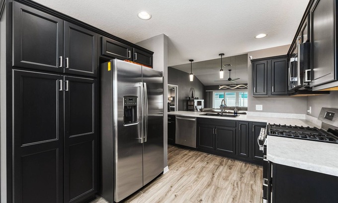 Wildwood Casa | 3 Bed 2 Bathroom Home in DeLuna with golf cart.