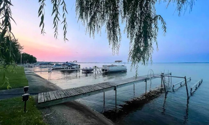 Houghton Lake Casa | 3 Beds with Dock, Hoist, and 40 ft of Waterfront!