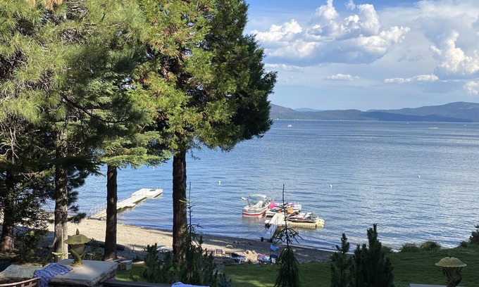 Peninsula Village Casa | 3 Story Lake Front Home with Dock and Beach