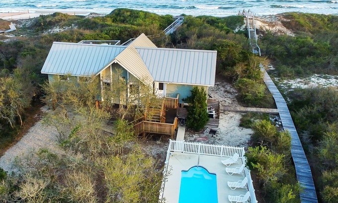 Sea Palm Village Casa | ¡El mejor valor frente al mar en SGI! 4 dormitorios / 2 baños, piscina climatizada, spa y comentarios increíbles.