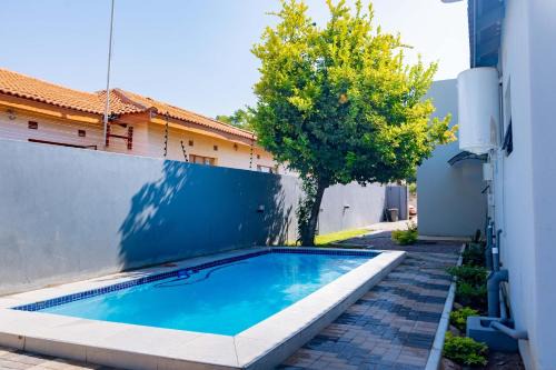 North-West District Apartamento | 3BD Poolside Paradise Fast Starlink Wi-Fi Near CBD and Airport