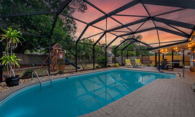 Seminole Casa | 3BR/2BA Pet & Kid-Friendly Oasis w Heated Pool, Swingset, Game Rm, Near Beach