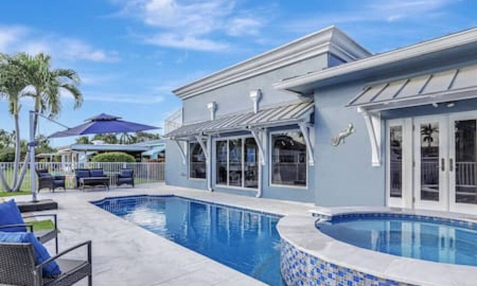 South New River Isles Casa | 3BR Waterfront Villa with Heated Pool, Spa, & Rooftop Deck