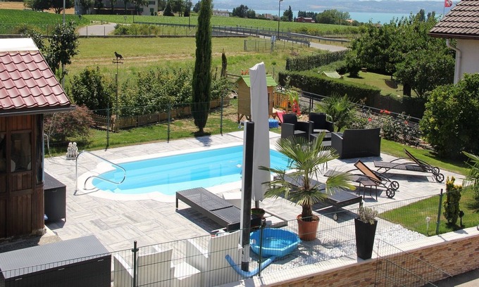 Bevaix Apartamento | apartamento 3pc con entrada independiente, piscina, jacuzzi y jardín
