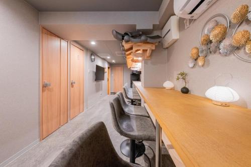 Higashishinsaibashi Apartamento | 4階 ホテル福 道頓堀に位置する宿 ベッド9台 シャワー2台 観光に最適